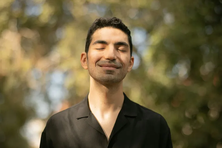 A man relaxed with his eyes closed, calm and at ease